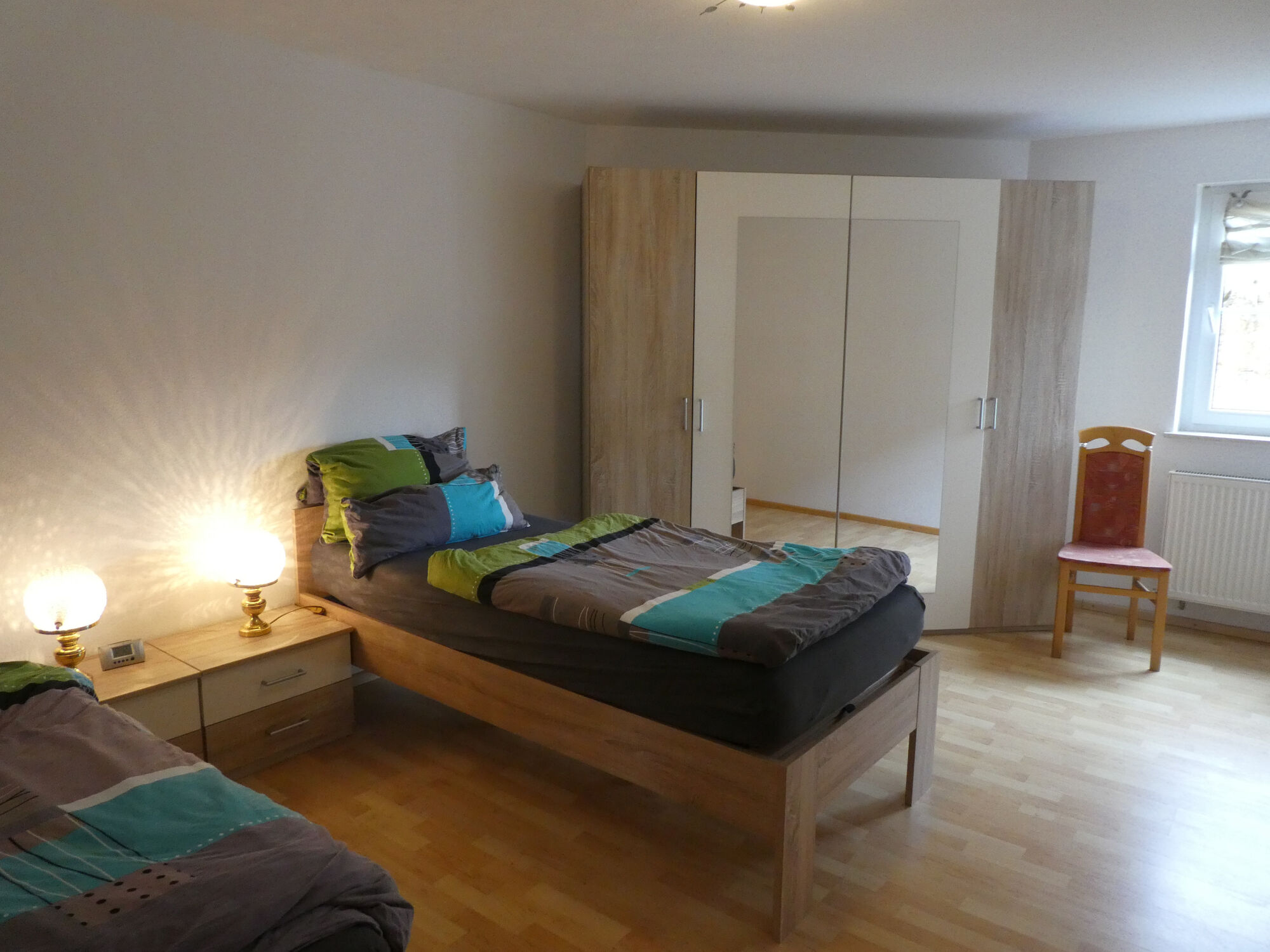 Schlafzimmer mit 2 Einzelbetten die auch zum Doppelbett zusammengestellt werden können
